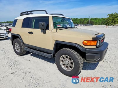 Czwarte zdjęcie samochodu z boku: 2013 TOYOTA FJ CRUISER BASE VIN:JTEBU4BF7DK150280 - miniatura