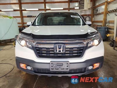 Piąte zdjęcie samochodu w środku: 2017 HONDA RIDGELINE RTS VIN:5FPYK3F42HB030694 - miniatura