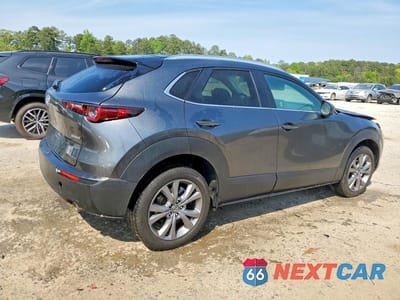 Trzecie zdjęcie samochodu z tyłu: 2025 MAZDA CX-30 PREFERRED VIN:3MVDMBCM9SM751080 - miniatura