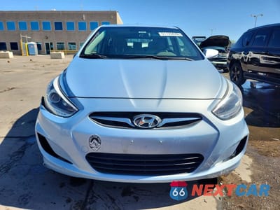 Piąte zdjęcie samochodu w środku: 2014 HYUNDAI ACCENT SE VIN:KMHCU5AE6EU160095 - miniatura