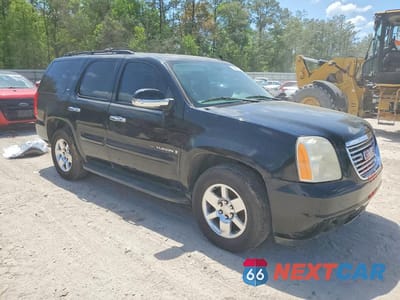 Czwarte zdjęcie samochodu z boku: 2009 GMC YUKON SLT VIN:1GKEC33329R220211 - miniatura