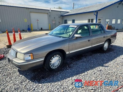 1999 CADILLAC DEVILLE 1G6KD54Y9XU806502 - główne zdjęcie licytacji z USA - miniatura
