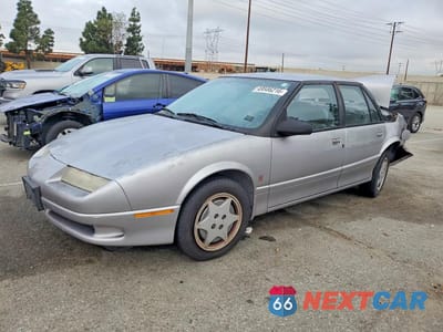 1995 SATURN SL2 1G8ZK5275SZ381569 - główne zdjęcie licytacji z USA - miniatura
