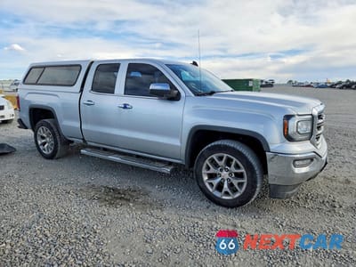Czwarte zdjęcie samochodu z boku: 2018 GMC SIERRA K1500 SLT VIN:1GTV2NEC0JZ207128 - miniatura
