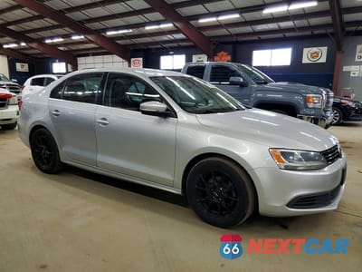 Czwarte zdjęcie samochodu z boku: 2014 VOLKSWAGEN JETTA SE VIN:3VWD17AJ9EM306632 - miniatura