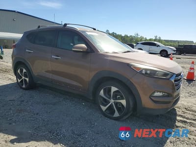 Czwarte zdjęcie samochodu z boku: 2016 HYUNDAI TUCSON LIMITED VIN:KM8J33A20GU152629 - miniatura