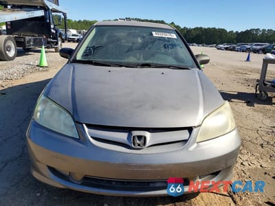 Piąte zdjęcie samochodu w środku: 2005 HONDA CIVIC DX VP VIN:1HGES16305L007156 - miniatura