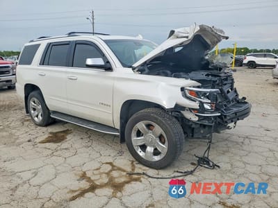 Czwarte zdjęcie samochodu z boku: 2017 CHEVROLET TAHOE K1500 PREMIER VIN:1GNSKCKC0HR134601 - miniatura