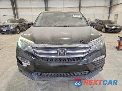 Piąte zdjęcie samochodu w środku: 2018 HONDA PILOT EXLN VIN:5FNYF5H74JB027592 - miniatura