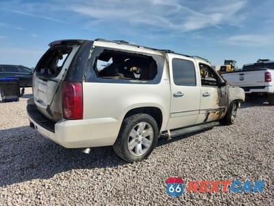 Trzecie zdjęcie samochodu z tyłu: 2011 GMC YUKON XL K1500 SLT VIN:1GKS2KE3XBR240970 - miniatura