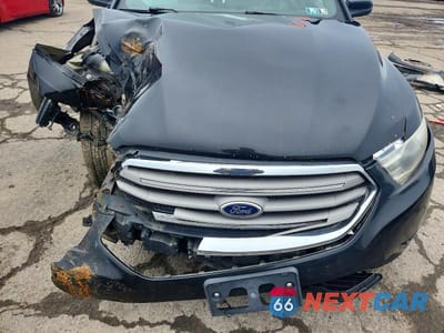 Zdjęcie 11 z 11 samochodu: 2014 FORD TAURUS SEL VIN:1FAHP2H89EG131887 - miniatura