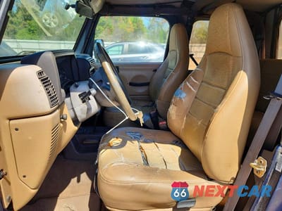 Zdjęcie 7 z 11 samochodu: 2000 JEEP WRANGLER / TJ SPORT VIN:1J4FA49SXYP751820 - miniatura