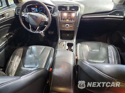 Zdjęcie 8 z 12 samochodu: 2017 FORD FUSION TITANIUM VIN:3FA6P0K98HR118087 - miniatura