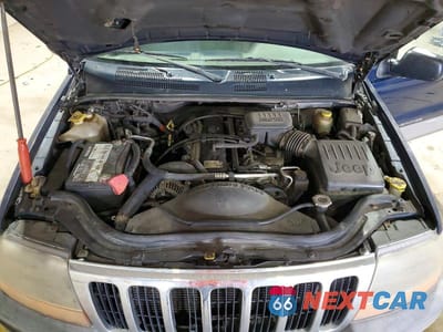 Zdjęcie 12 z 13 samochodu: 2000 JEEP GRAND CHEROKEE LAREDO VIN:1J4GW48S6YC154257 - miniatura