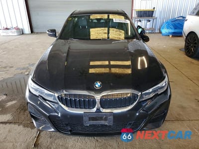 Piąte zdjęcie samochodu w środku: 2021 BMW 330I VIN:3MW5R1J05M8B58603 - miniatura
