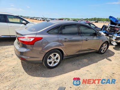 Trzecie zdjęcie samochodu z tyłu: 2013 FORD FOCUS SE VIN:1FADP3F21DL359875 - miniatura