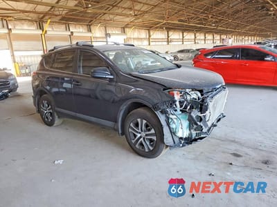 Czwarte zdjęcie samochodu z boku: 2018 TOYOTA RAV4 LE VIN:JTMZFREV1JJ749805 - miniatura