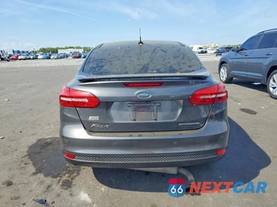 Zdjęcie 6 z 12 samochodu: 2017 FORD FOCUS TITANIUM VIN:1FADP3J29HL281696 - miniatura