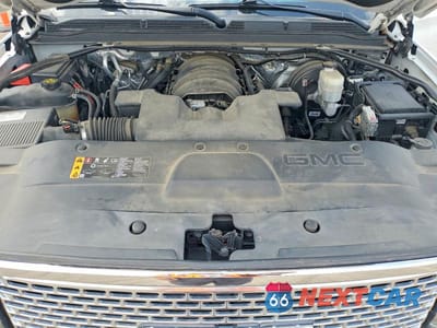 Zdjęcie 11 z 12 samochodu: 2017 GMC YUKON DENALI VIN:1GKS1CKJ5HR213163 - miniatura