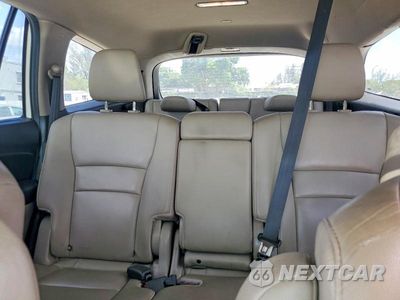 Zdjęcie 10 z 13 samochodu: 2019 HONDA PILOT TOURING VIN:5FNYF5H90KB012980 - miniatura