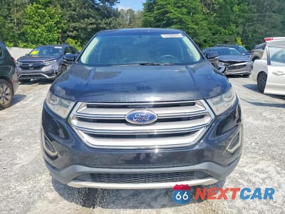 Piąte zdjęcie samochodu w środku: 2018 FORD EDGE TITANIUM VIN:2FMPK3K93JBB06346 - miniatura
