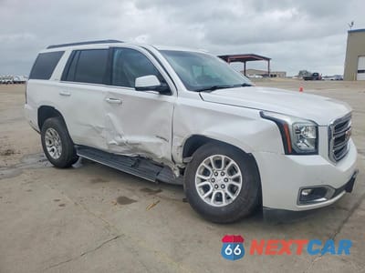 Czwarte zdjęcie samochodu z boku: 2019 GMC YUKON SLT VIN:1GKS2BKC0KR323750 - miniatura