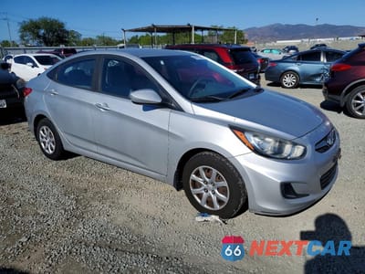Czwarte zdjęcie samochodu z boku: 2012 HYUNDAI ACCENT GLS VIN:KMHCT4AE4CU219381 - miniatura