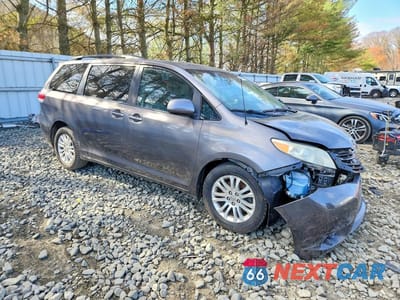 Czwarte zdjęcie samochodu z boku: 2011 TOYOTA SIENNA XLE 8-PASSENGER VIN:5TDYK3DC1BS149231 - miniatura