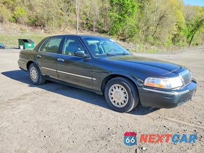 Czwarte zdjęcie samochodu z boku: 2003 MERCURY GRAND MARQUIS GS VIN:2MEFM74W03X627226 - miniatura