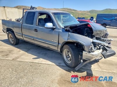 Czwarte zdjęcie samochodu z boku: 1999 CHEVROLET SILVERADO K1500 VIN:1GCEK19V4XE218301 - miniatura