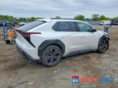 Trzecie zdjęcie samochodu z tyłu: 2024 TOYOTA BZ4X LIMITED VIN:JTMABACA9RA070063 - miniatura