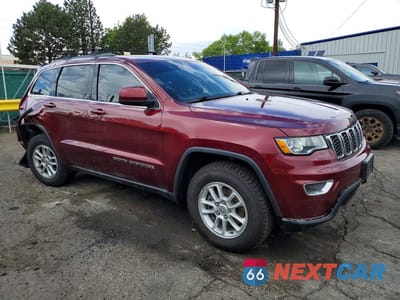 Czwarte zdjęcie samochodu z boku: 2018 JEEP GRAND CHEROKEE LAREDO VIN:1C4RJFAG6JC266948 - miniatura