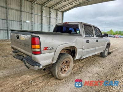 Trzecie zdjęcie samochodu z tyłu: 2004 GMC NEW SIERRA K1500 VIN:2GTEK13T041370791 - miniatura