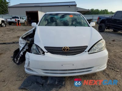Piąte zdjęcie samochodu w środku: 2002 TOYOTA CAMRY XLE V6 VIN:JTDBF30K720001725 - miniatura