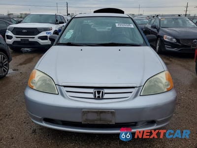 Piąte zdjęcie samochodu w środku: 2001 HONDA CIVIC LX VIN:1HGES165X1L049779 - miniatura