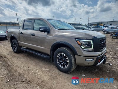 Czwarte zdjęcie samochodu z boku: 2024 NISSAN TITAN PRO-4X VIN:1N6AA1ED4RN111280 - miniatura