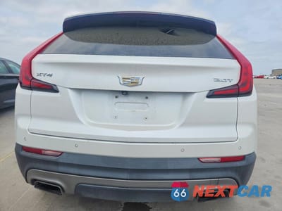 Zdjęcie 6 z 12 samochodu: 2019 CADILLAC XT4 PREMIUM LUXURY VIN:1GYFZCR44KF211736 - miniatura