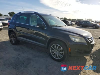 Czwarte zdjęcie samochodu z boku: 2010 VOLKSWAGEN TIGUAN SE VIN:WVGBV7AX8AW001079 - miniatura