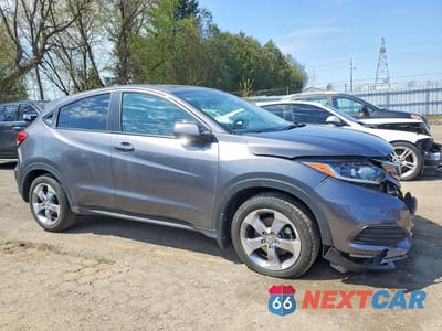 Czwarte zdjęcie samochodu z boku: 2019 HONDA HR-V LX VIN:3CZRU5H35KM101262 - miniatura