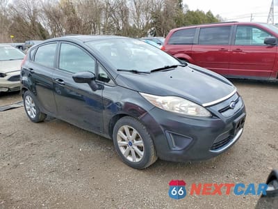 Czwarte zdjęcie samochodu z boku: 2012 FORD FIESTA SE VIN:3FADP4EJ5CM151848 - miniatura