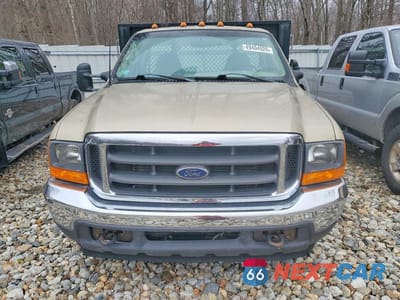 Piąte zdjęcie samochodu w środku: 2001 FORD F350 SUPER DUTY FLATBED TRUCK VIN:1FDWF36F61EC22922 - miniatura