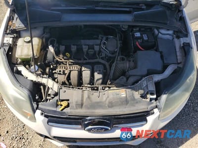 Zdjęcie 11 z 12 samochodu: 2012 FORD FOCUS TITANIUM VIN:1FAHP3J20CL468495 - miniatura
