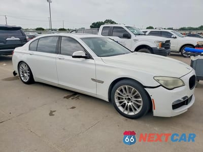 Czwarte zdjęcie samochodu z boku: 2015 BMW 750 LI VIN:WBAYE8C5XFD781571 - miniatura