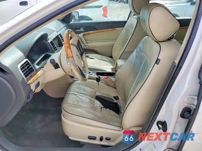Zdjęcie 7 z 12 samochodu: 2012 LINCOLN MKZ HYBRID VIN:3LNDL2L35CR822156 - miniatura