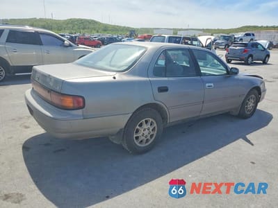 Trzecie zdjęcie samochodu z tyłu: 1992 TOYOTA CAMRY XLE VIN:4T1SK13E3NU140622 - miniatura