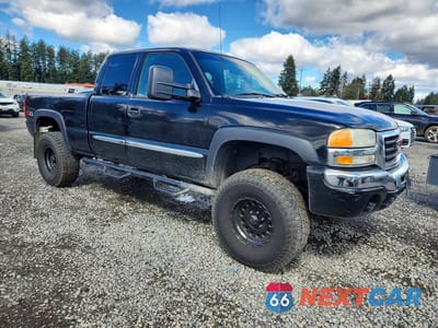 Czwarte zdjęcie samochodu z boku: 2003 GMC NEW SIERRA K1500 VIN:1GTEK19T93E288563 - miniatura