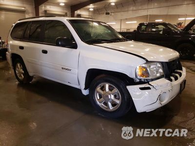 Czwarte zdjęcie samochodu z boku: 2004 GMC ENVOY VIN:1GKDT13SX42114968 - miniatura
