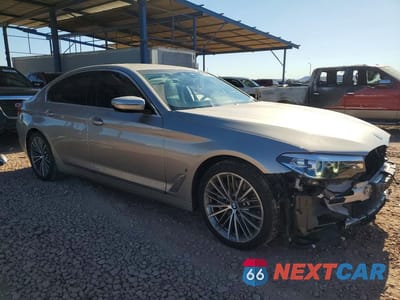 Czwarte zdjęcie samochodu z boku: 2019 BMW 530E VIN:WBAJA9C56KB389308 - miniatura