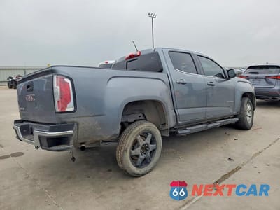 Trzecie zdjęcie samochodu z tyłu: 2018 GMC CANYON SLE VIN:1GTG5CEA4J1289639 - miniatura