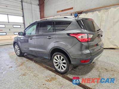 Drugie zdjęcie samochodu z przodu: 2017 FORD ESCAPE TITANIUM VIN:1FMCU9J9XHUC57797 - miniatura